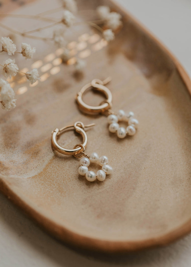 pair of pearl hoop earrings