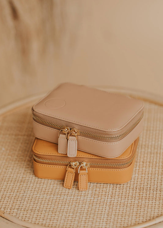 A travel jewelry organizer from Hello Adorn, a small jewelry case to take with you on all your travel adventures offered in two colors.