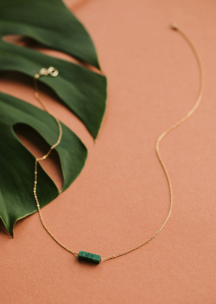 A stone necklace from the Gemma Collection from Hello Adorn, this green stone necklace is handmade from a green gemstone and a dainty gold chain necklace to create this statement necklace.