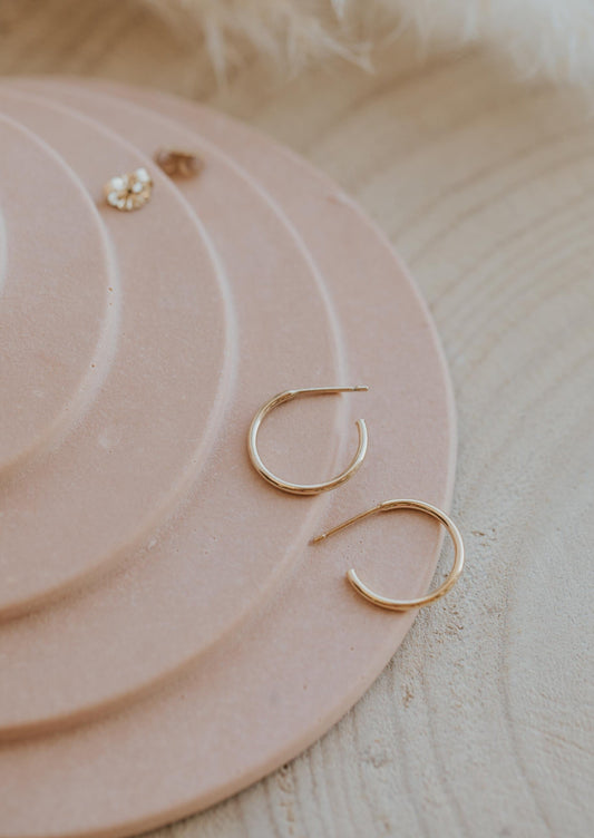 Gold hoop earrings made for everyday wear by Hello Adorn in 14k gold fill.