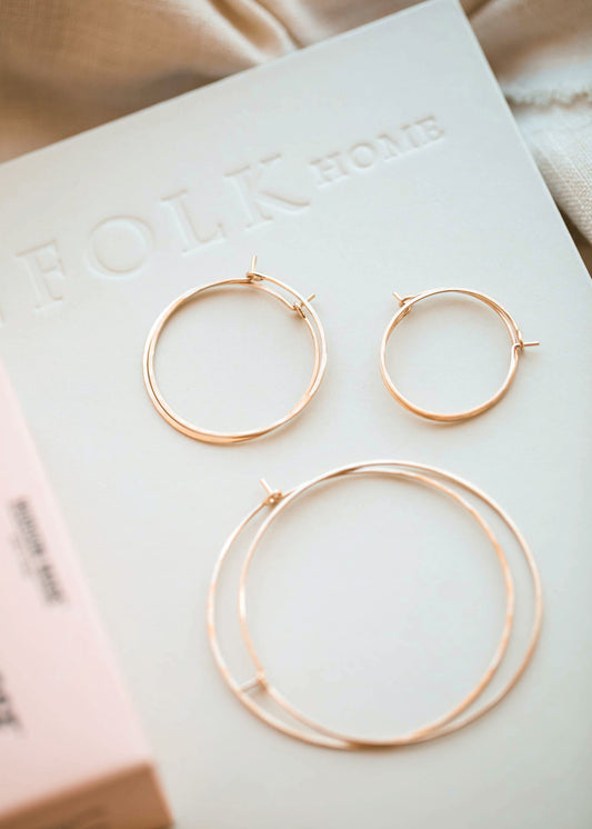 Thin hoop earrings in Cypress Hoops by Hello Adorn, shown in three sizes of Hoops from smallest hoop earrings to largest hoop earrings for daily wear earrings.