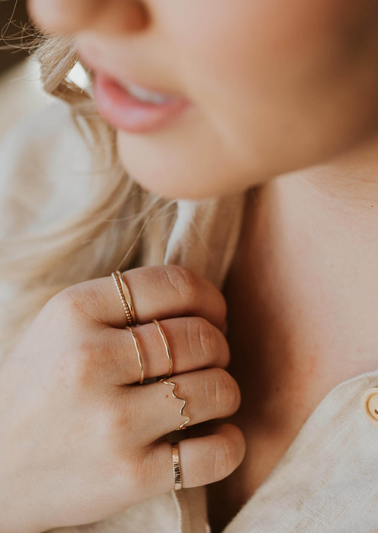 A simple ring stack idea from Hello Adorn using a beaded ring, a wavy ring, and a wire ring created into an open ring style called the Revolve Ring.