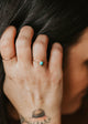 model wearing faye ring with turquoise gemstone