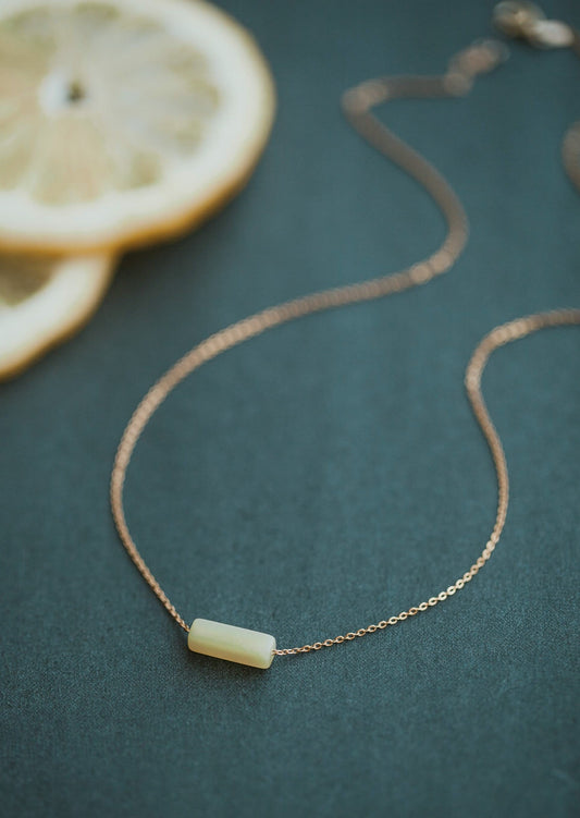 A stone necklace from Hello Adorn's stone jewelry collection, this gold necklace chain features a yellow stone to create a statement yellow stone necklace.