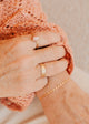 14K Gold Fill Bold Initial Band by Hello Adorn - worn on model's finger alongside Rosalie ring and stacked rings