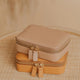 A travel jewelry organizer from Hello Adorn, a small jewelry case to take with you on all your travel adventures offered in two colors.