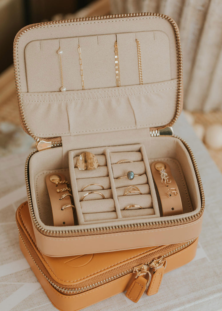 A filled jewelry case from Hello Adorn showing how to pack the best jewelry travel case with all your jewelry.