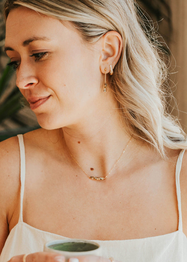 Woman holding a mug with a blurred background