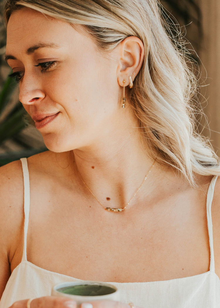 Woman holding a mug with a blurred background