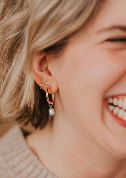 pearl dangle drop earrings on model