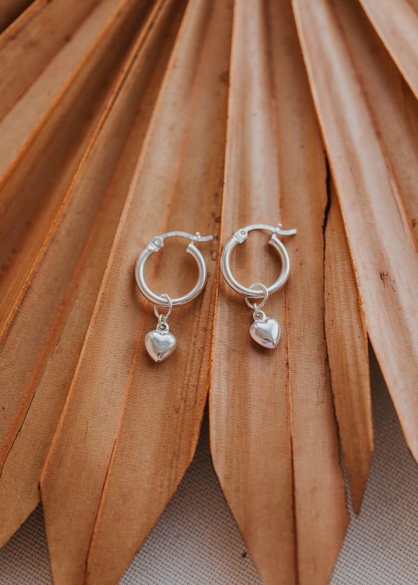 silver hoops with puff heart charm