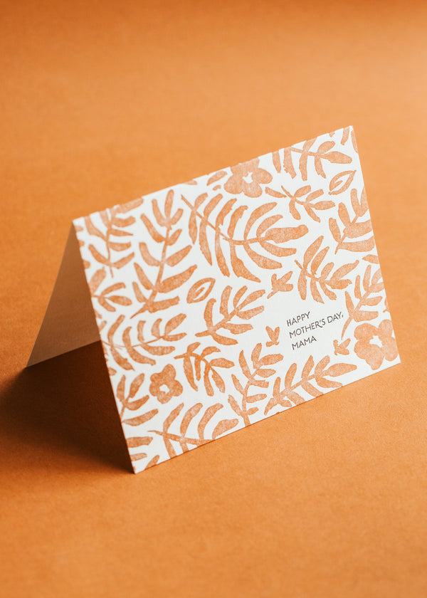 Greeting card with leaf pattern on a brown background