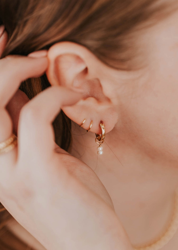 model showing styled earrings