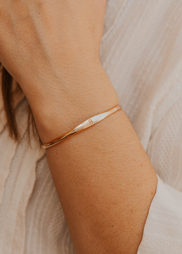 14K Gold Fill Signet Cuff by Hello Adorn - single cuff with letter C engraved on tapered center panel on prop