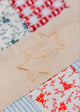 Hello Adorn Star Threader Earrings featuring a sculptural star-shaped Americana design.