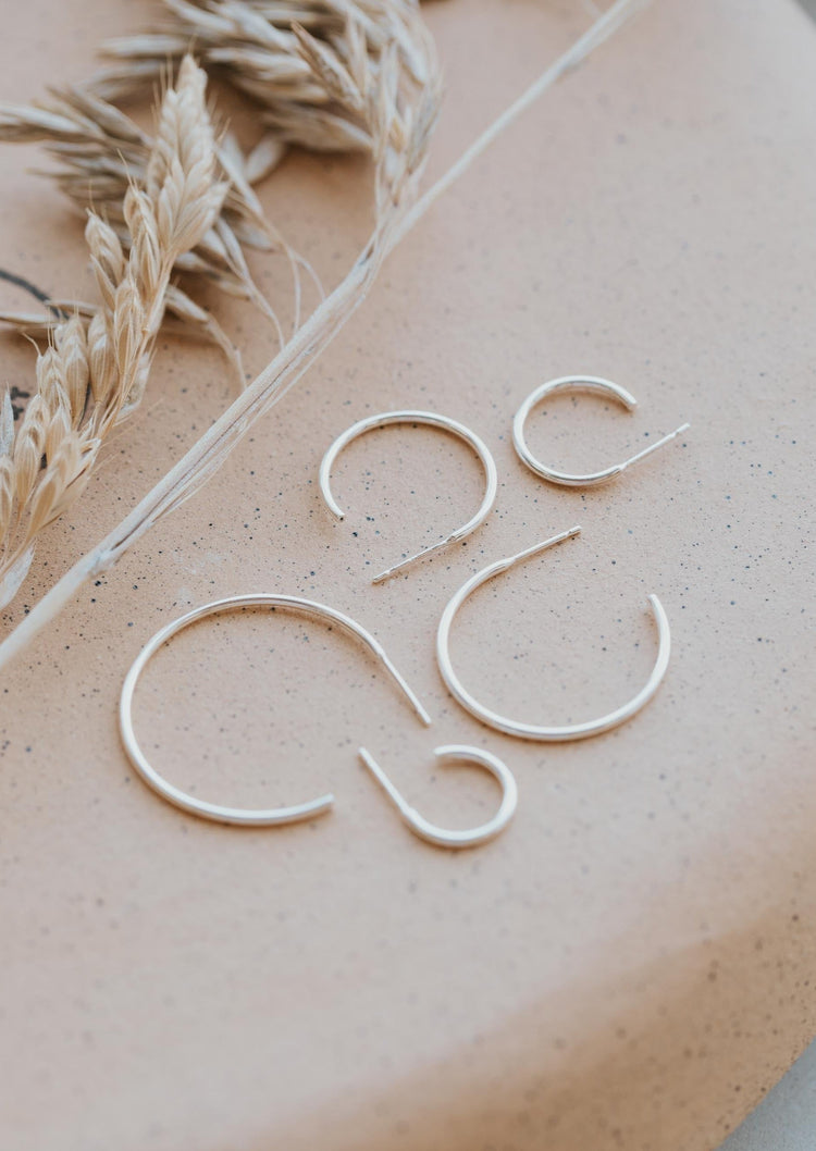Silver hoops in five different sizes by Hello Adorn made for everyday jewelry wear.