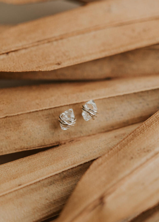 Sterling silver studs using herkimer diamonds wrapped in wire by Hello Adorn.