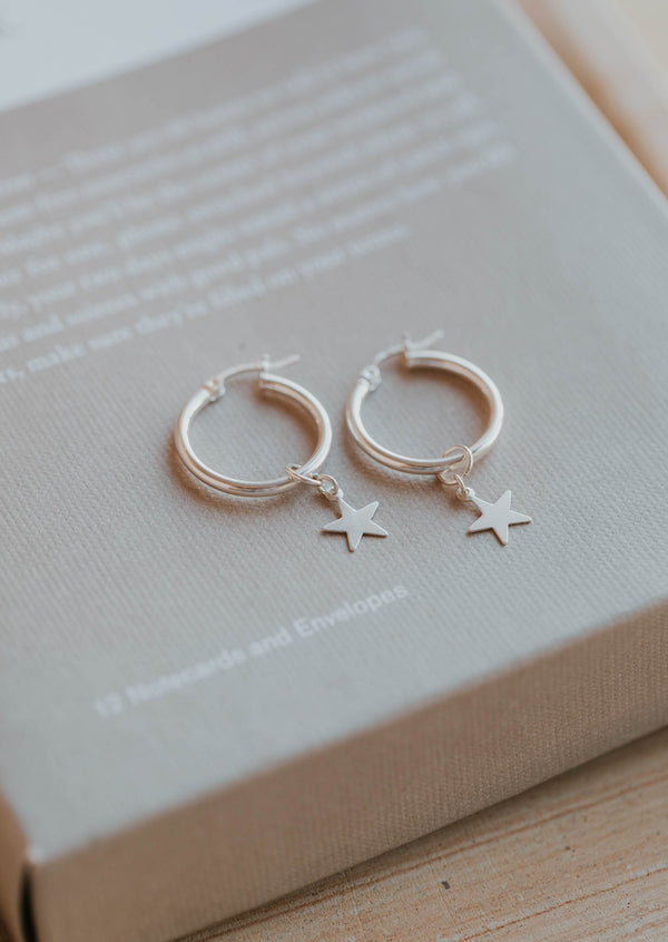 star charms on hoops in silver