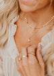 14K Gold Fill Rosalie Necklace by Hello Adorn - pink stone pendant layered with coin chain worn on model's chest