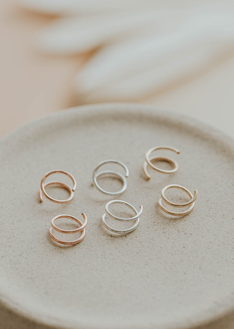 Close-up of Hello Adorn tiny twist earrings