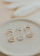 Close-up of Hello Adorn tiny twist earrings