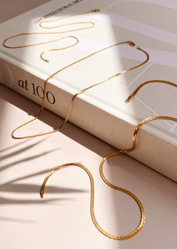 Gold herringbone necklace by Hello Adorn shown in three styles of delicate gold necklace, classic, and bold.
