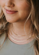 Layering gold chain necklace in Herra style by Hello Adorn shown in three different lengths.
