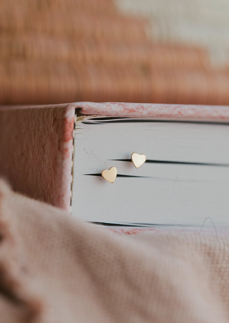 Heart stud earrings perfect for valentines gift idea or an everyday staple by Hello Adorn shown in 14k gold fill.