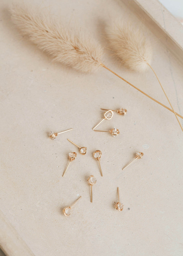 Herkimer diamonds created into stud earrings by Hello Adorn shown in 14k gold fill.