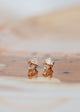 Handmade jewelry using herkimer diamonds shown in 14k gold fill to create diamond quartz stud earrings by Hello Adorn.