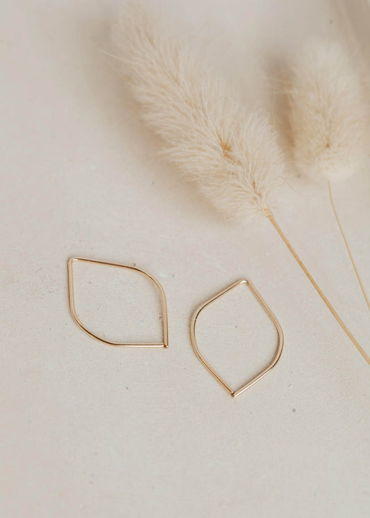 Wire earrings made into petal earrings in a thread through earrings style by Hello Adorn shown in 14k gold fill.