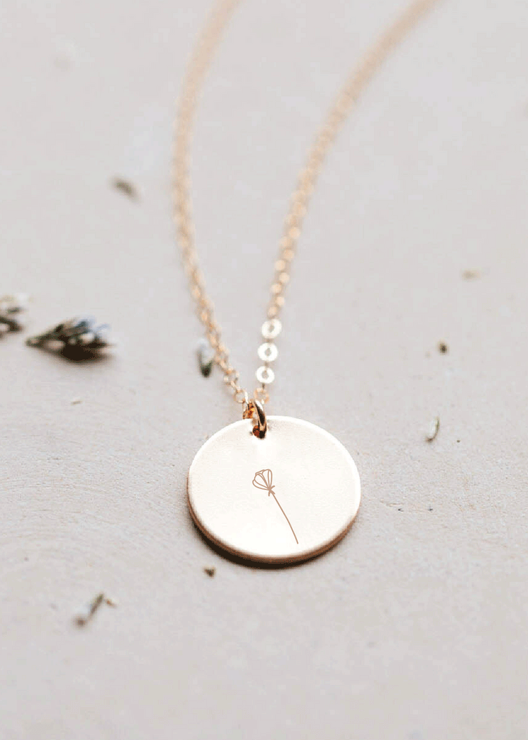 A custom necklace with pendant, this floral pendant necklace can have one or more flower hand stamped on jewelry to create the Raising Wildflowers Necklace by Hello Adorn.