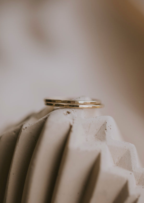Gold thin ring with a hammered ring texture in tiny hammered band style by Hello Adorn.