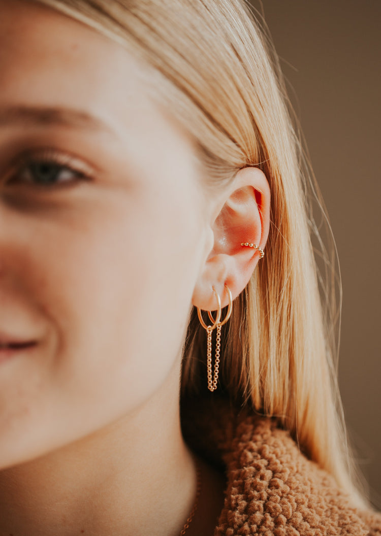 Earrings with attached ear sales cuff