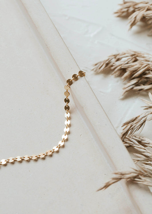 A beautiful 14kt Gold Fill confetti disc bracelet.