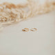 A thick ear cuff and a thin ear cuff sold as a pair in the Ear Cuff Duo by Hello Adorn which features a pair of ear cuffs as without piercing earrings.