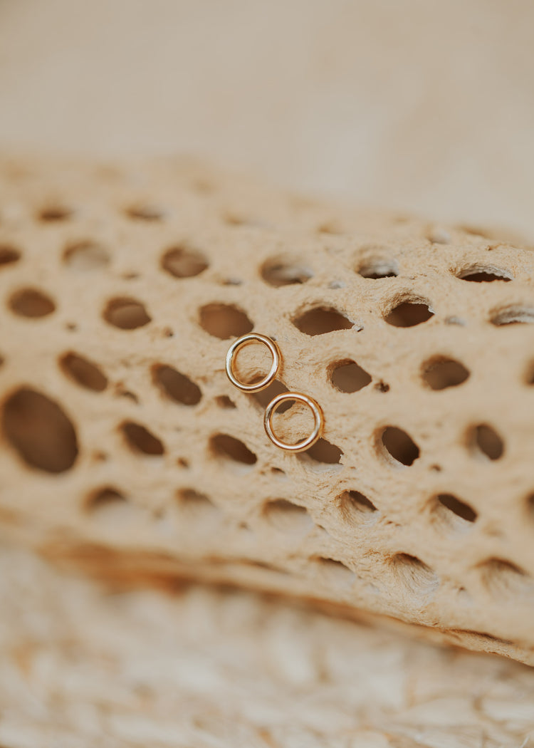 Circle earrings handmade jewelry by Hello Adorn in an open circle stud earrings style in 14k gold fill, the perfect stud earrings for everyday wear.