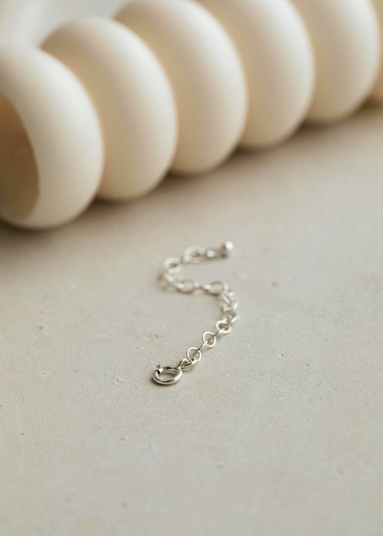 Hello Adorn's extender chain in sterling silver to change the length of your necklace.