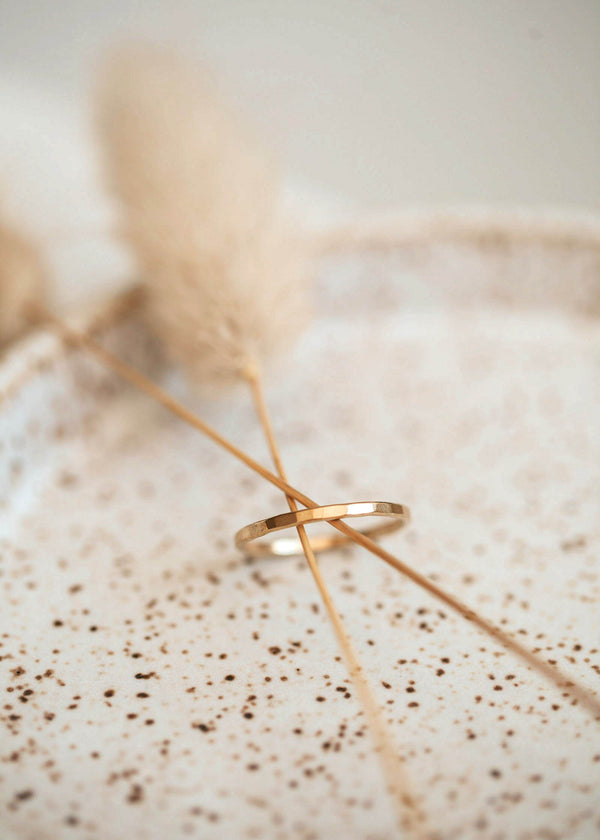 A simple ring design created by Hello Adorn in Aden Band, a gold hammered ring band.