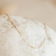 The Maeve Chain by Hello Adorn, a linked chain necklace used as a layering chain to add to a necklace stack.
