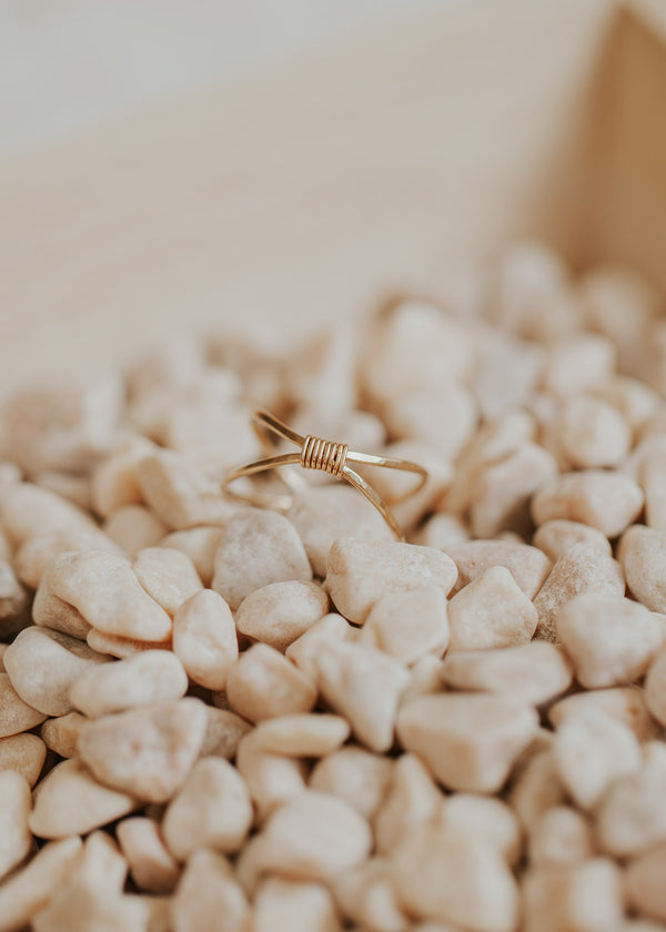 A close up look at the Cleo ring by Hello Adorn, featuring a wire wrapped ring perfect for a statement ring in your next ring stack that was handmade in Eau Claire, Wisconsin.