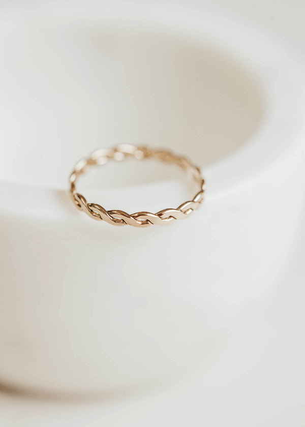 A 14k gold fill criss cross ring handmade by Hello Adorn, a stacking ring to finish off your new ring stack idea.
