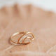 A double rainbow in 14k gold fill with a wire wrapped detail to create a wire wrapped ring by Hello Adorn in the Raye Ring style.