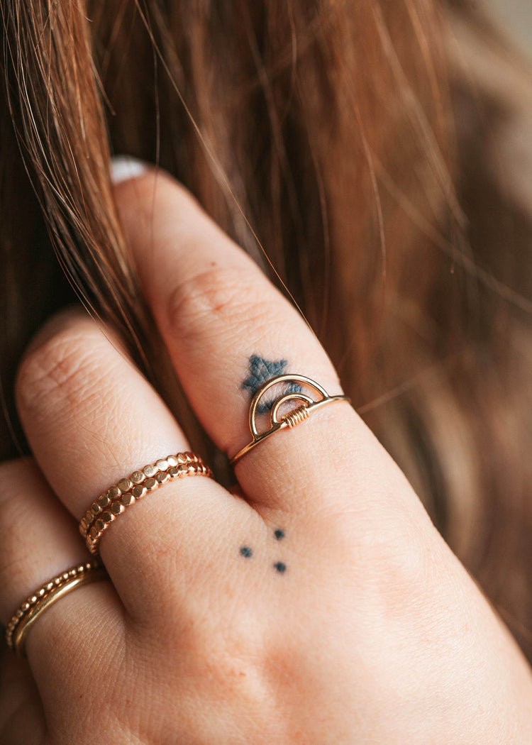 14kt Gold Fill rings stacked beautifully together featuring a double arc rainbow ring.