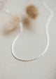 A neutral flat curb chain choker in Sterling Silver.