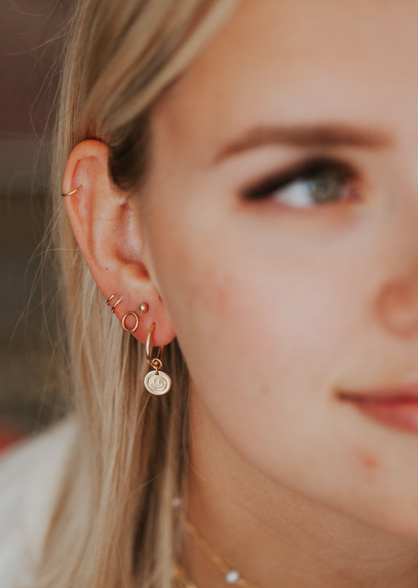 Smiley Face Drop Earrings layered with other 14kt Gold FIll Earrings