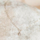 A sterling silver stone necklace handmade by Hello Adorn featuring a white stone in a bezel setting necklace diamond.