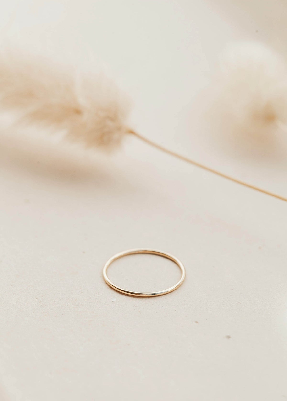 Gold Tenny-Tiny Band perfect for creating a ring stack by Hello Adorn.