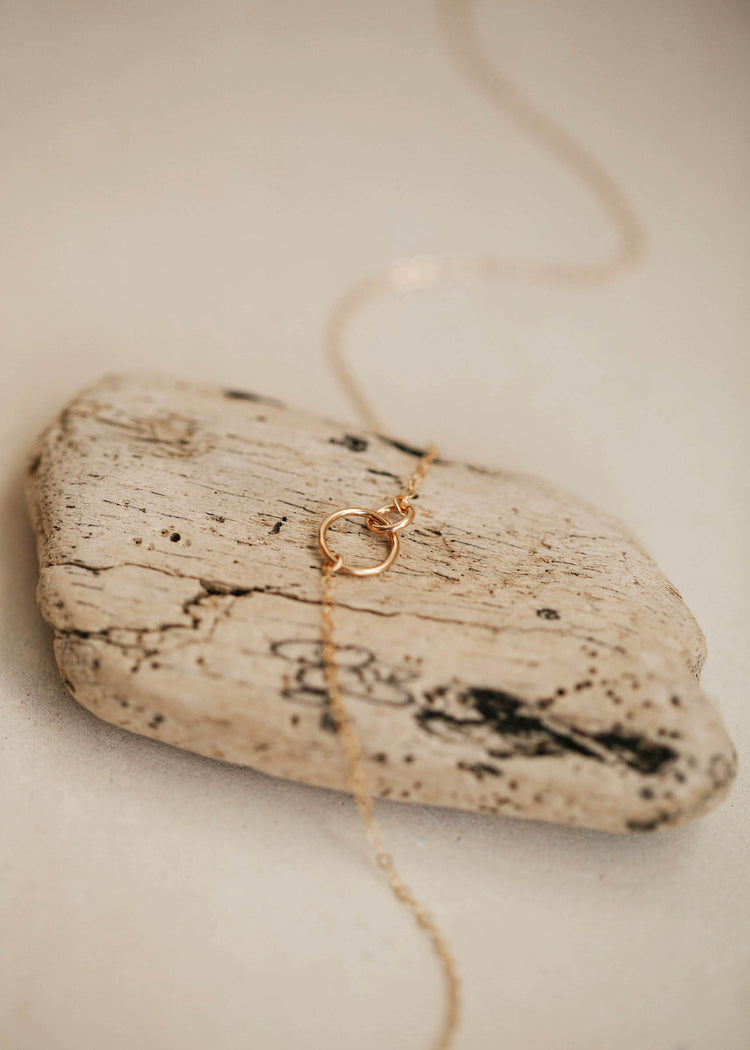 Tiny linked necklace by Hello Adorn in 14k gold fill.