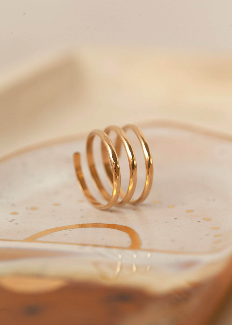Thicker wire used to create a wrap ring by Hello Adorn, a perfect addition to stacking rings to complete your ring stack look.